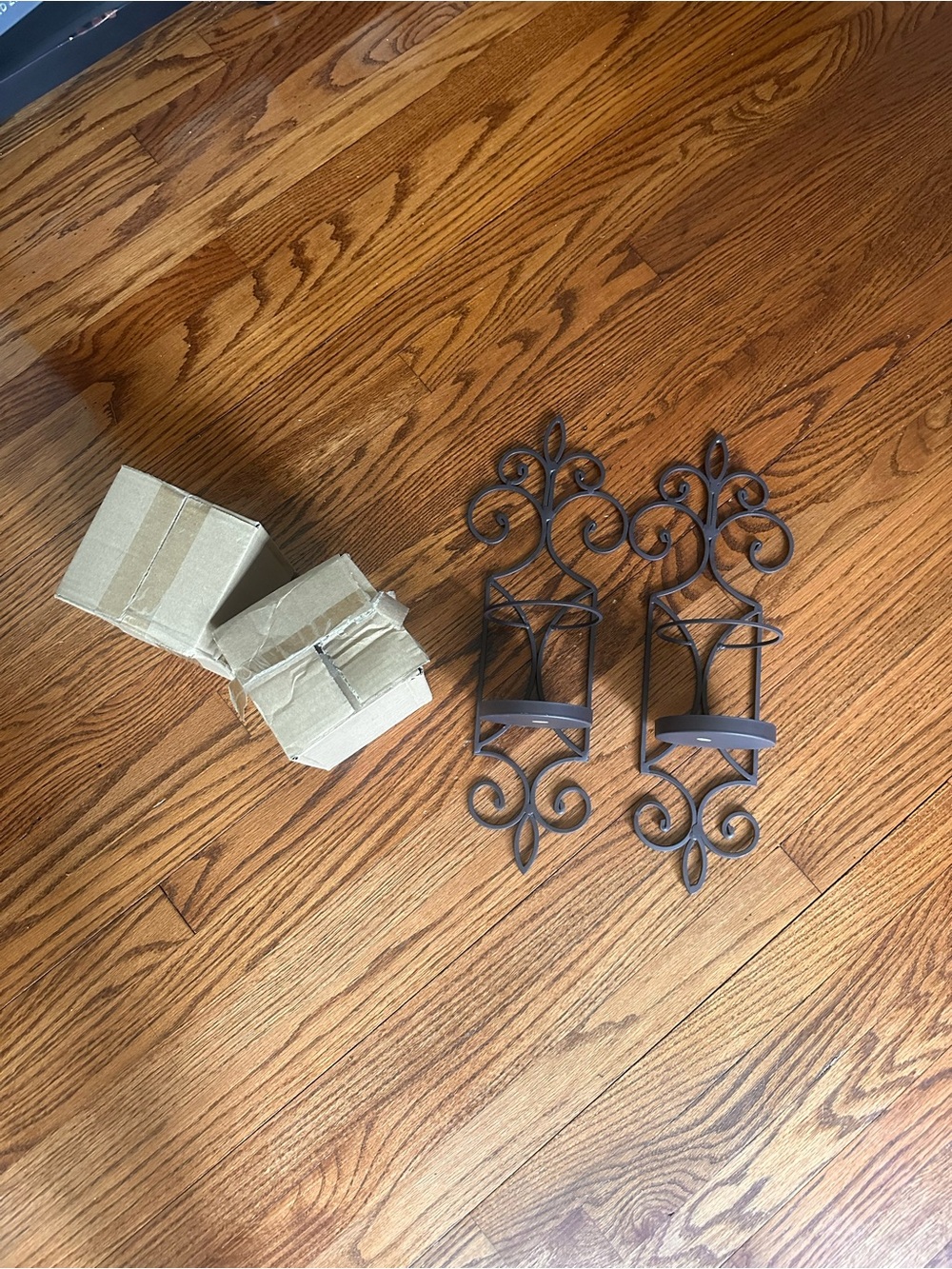 Set of two metal ironwork scroll candle sconces